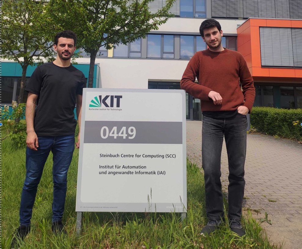 Rached Chaaben and Stefano  Maurogiovanni in front of the Steinbuch
   Centre for Computing 